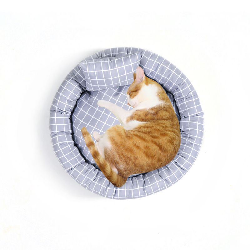 Bán buôn Giường tròn mềm mại ấm áp cho thú cưng với gối Donut Cuddler Cats Dogs Bed Giường thú cưng sang trọng với đáy chống trượt